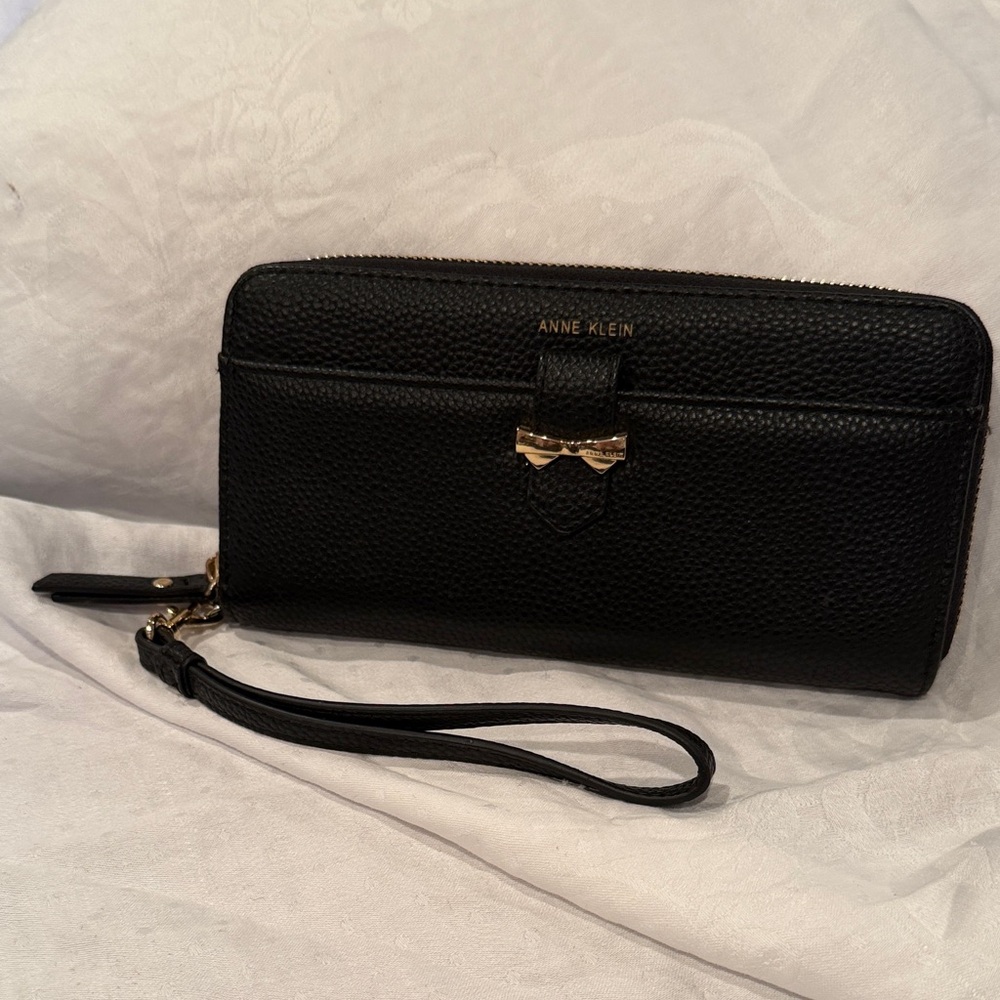 Anne Klein Black Pebbled Wristlet with Gold Bow Accent